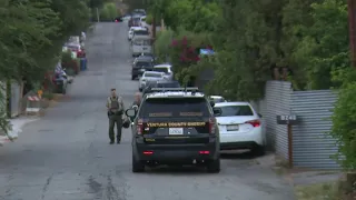 Armed suspect barricaded in Chatsworth home