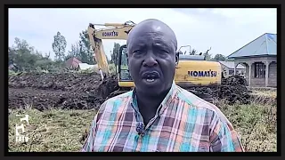 VILLAGERS CONTRIBUTE 30,000 PER HOUSEHOLD TO HIRE A GRADER AND DIG A LARGE DRAINAGE CANAL