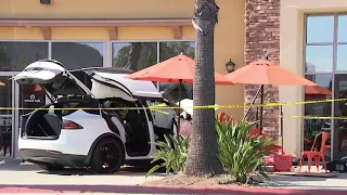 1 dead after Tesla slams into outdoor dining area; 5 others hurt