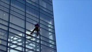 Superheroes rappelled down Johns Hopkins Children's Center to wash windows for young patients