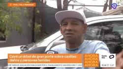 Tree falls on a house in the Banana neighborhood, trapping a family