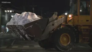 Southington crews remove large piles of snow from Main Street
