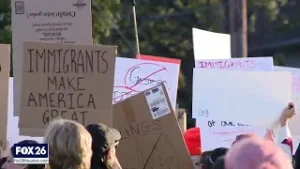 Demonstrators march in "ICE out of Houston" protest