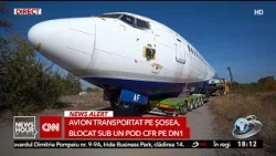 Airplane transported by road, stuck under a railway bridge on DN1