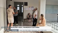Voters arrive before polls open to cast their ballots early
