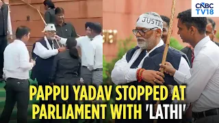 Pappu Yadav Carries 'Lathi' to Parliament | Protest Outside Parliament Goes Viral | NEET Leak | N18V