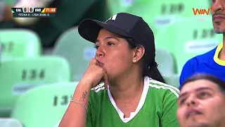 José García scores with a header to put Bucaramanga ahead against Deportivo Cali.