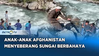 Bahaya! Warga Afghanistan Andalkan Kabel Sungai