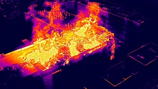 Infrared video shows intensity of apartment fire flames