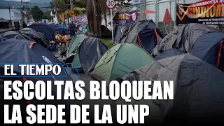 UNP bodyguard protest and removal of trash containers in Bogotá | EL TIEMPO