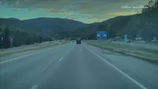 Bear runs into vehicle after crossing I-70 near Vail