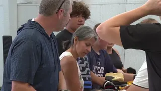 Football team steps in to help those displaced by Midvale Fire