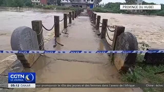Storm weakens over central China