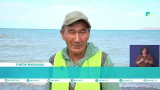 ТРУД У БЕРЕГА ОЗЕРА