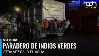 Granizada colapsa Indios Verdes; pasajeros cruzan entre lodo y agua