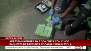 Arrestan hombre en Boca Chica con cinco paquetes de presunta cocaína y una pistola