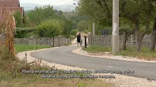 ASFALTIRANA PUTNA KOMUNIKACIJA U NASELJU BUZIĆI UZ PRUŽNI PRIJELAZ