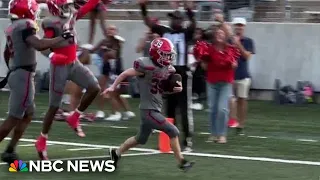 Student with Down syndrome scores touchdown during high school football game