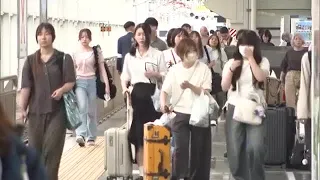 Platforms bustling with families carrying suitcases and souvenirs as U-turn rush peaks at JR Okay...
