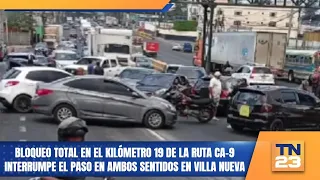 Total blockade at kilometer 19 of the CA-9 route halts traffic in both directions in Villa Nueva