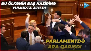 Baş nazirə yumurta atıldı, bu ölkənin parlamentində DAVA-DALAŞ düşdü: tərəflər bir-birinə “GİRDİ”