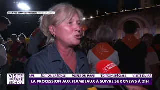 Waiting for the Pope, Odile, a member of the faithful, sings an Ave Maria in Lourdes