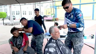 Belize Coast Guard Provides Free Back-to-School Haircuts and Braids for 400 Children