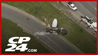 One person dead after cement truck rolls over on Hwy. 401 in Scarborough