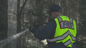 Fire near I-12 in Lacombe still burning
