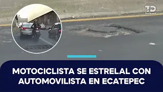 Motorcyclist crashes into vehicle while attempting to pass between two cars in Ecatepec