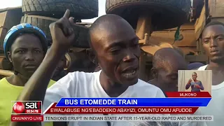 BUS ETOMEDDE TRAIN: Ewalabuse ng'ebaddeko abayizi, omuntu omu afudde.