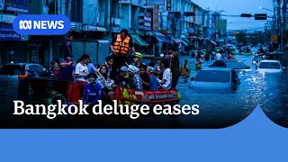 Bangkok suburbs inundated with floodwaters despite easing rainfall | ABC NEWS