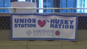 Fans head out of Union Station to cheer on the Huskies against St. John's in New York City