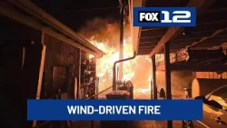 Wind-driven shed fire spreads to SE Portland home, 1 taken to hospital