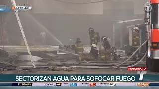 Firefighters battle blaze affecting several businesses in David