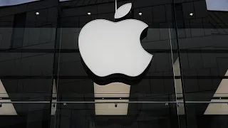 Apple stock falls despite record revenue, outlook disappoints