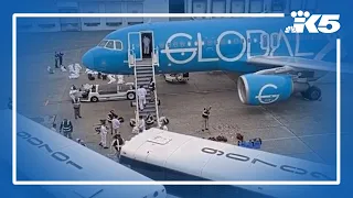 Protesters call for end of shackling on ICE flights from King County
