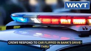 Crews respond to car flipped in Lexington bank’s drive-thru
