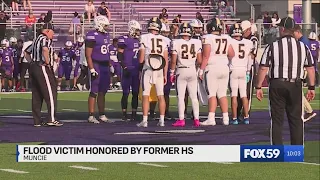 Muncie football teams honor flood victim during 1st game of season
