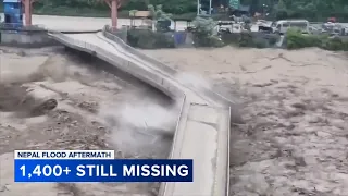 Death toll rises in Nepal-China border disaster as lake poses new flood threat