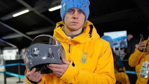 Ukrainian athlete drops out of of Winter Olympics over banned helmet