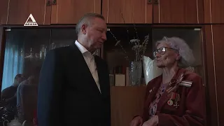 As part of their visit, Vladimir Delba and Alexander Beglov visited a siege survivor living in Su...