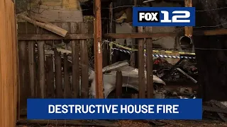 Downed power line, ruptured gas meter challenge crews at SE Portland house fire