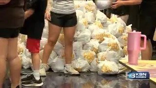 Hope Wichita volunteers stuff 500 backpacks for giveaway