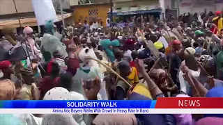 SOLIDARITY WALK: Aminu Ado Bayero Walks With Crowd In Heavy Rain In Kano