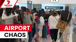 Passport system crash causes airport chaos | 7NEWS