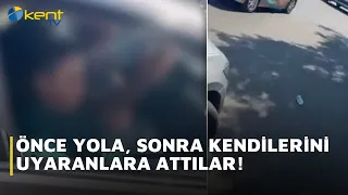 FIRST THEY THREW IT ON THE ROAD, THEN AT THE PEOPLE WHO CONFRONTED THEM!