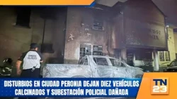 Disturbances in Ciudad Peronia leave ten vehicles incinerated and police substation damaged