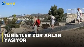 TOURISTS HAVE A ROUGH TIME