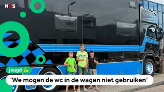 These brothers are going on vacation in a truck